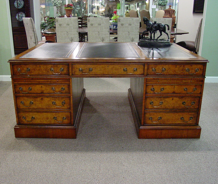 Walnut 6' X 4' black leather top partners desk.